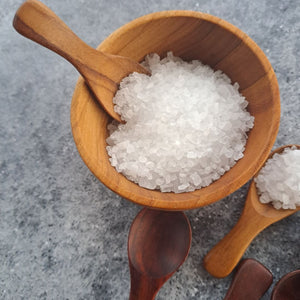 Small wooden bowl and wooden salt spoons