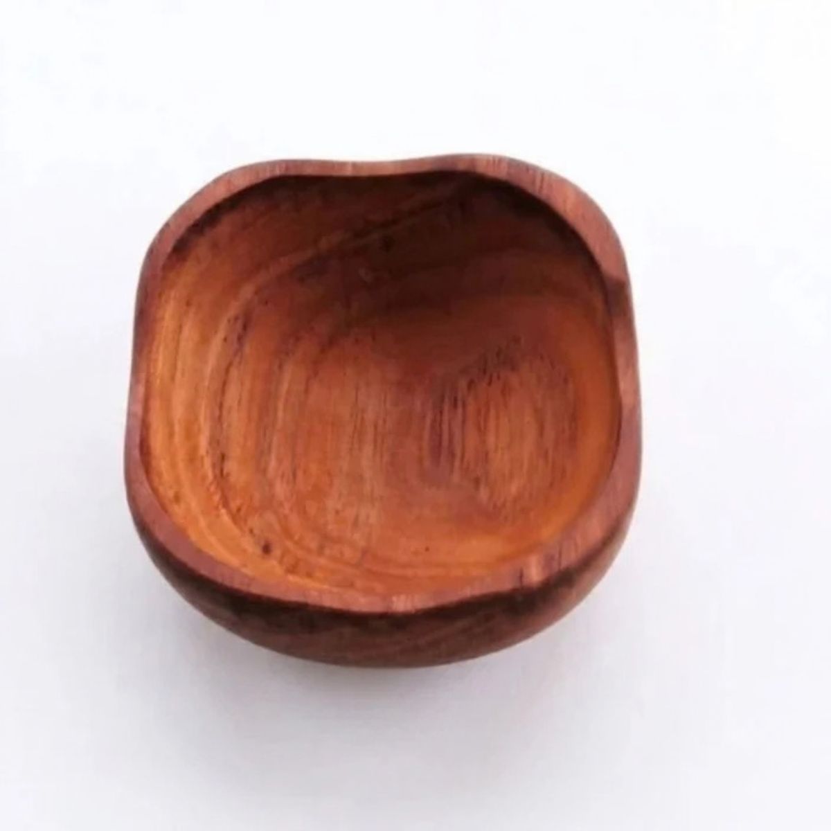 Small handcrafted square teak wooden bowl with natural grain detail on a white background, 6 cm size.