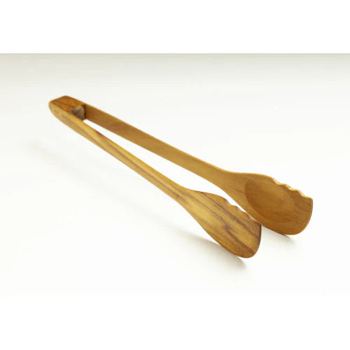 A professional product shot of a handcrafted teak wooden knife on a white background, featuring a sharp serrated edge and a smooth, ergonomic handle that showcases the natural golden-brown wood grain