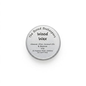 Nourish and protect your handcrafted wooden utensils with this 100% natural wood wax. Made locally in Gisborne by The Bored Beekeepers, this food-safe blend combines pure beeswax with almond, olive, and coconut oils to restore natural luster, prevent drying, and build a protective barrier on teak spoons, spatulas, and boards. Perfectly sized as a compact sample or travel tin to keep your wooden kitchenware looking smooth and well-cared for.