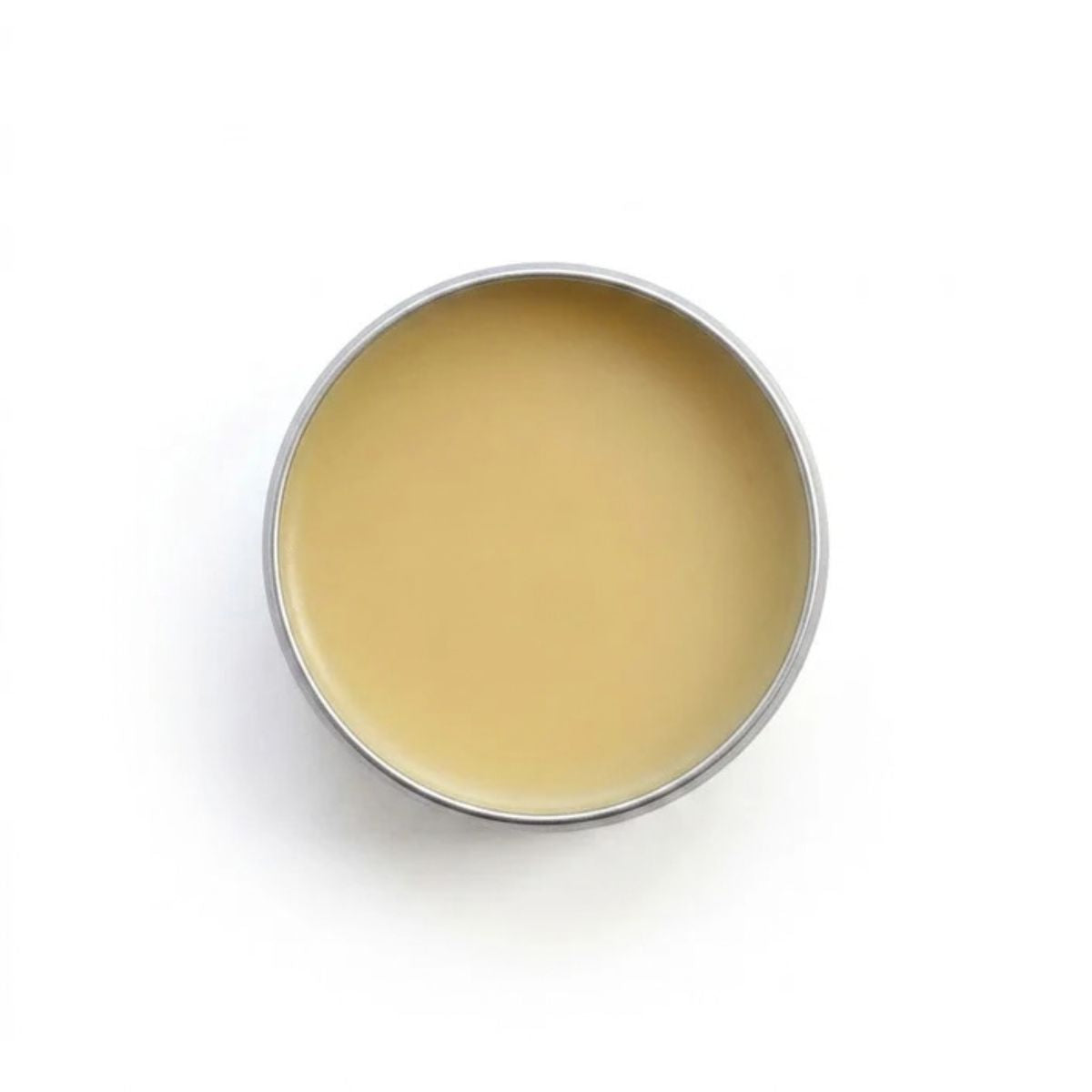 A top-down view of our 100% natural, food-safe wood wax conditioner, showing its rich, buttery texture and clean, golden tone. Handcrafted in Gisborne by The Bored Beekeepers, this smooth blend of pure beeswax with almond, olive, and coconut oils absorbs easily into dense timber to nourish the wood grain and create a lasting protective seal on handcrafted teak spatulas, spoons, and boards.