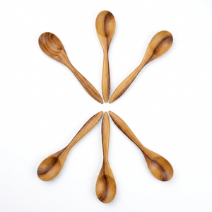 Set of 6 handcrafted teaspoons on a white background