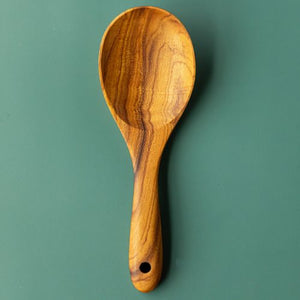 Handcrafted wooden rice serving spoon, with a gorgeous grain. The handle is handsanded, and rounded, making it easy and smooth to hold.