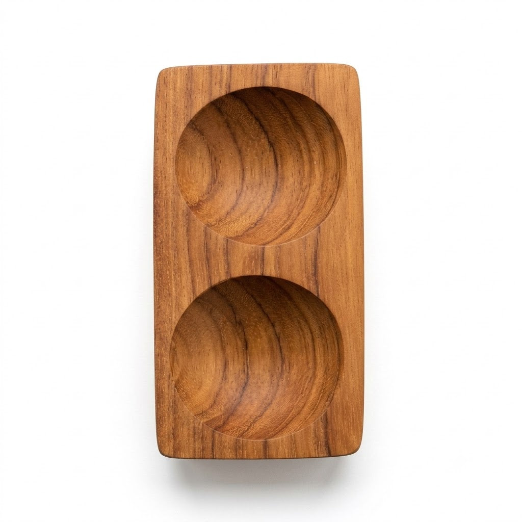 A Teak Wood bowl, with two indents, designed for condiments and spices on your table