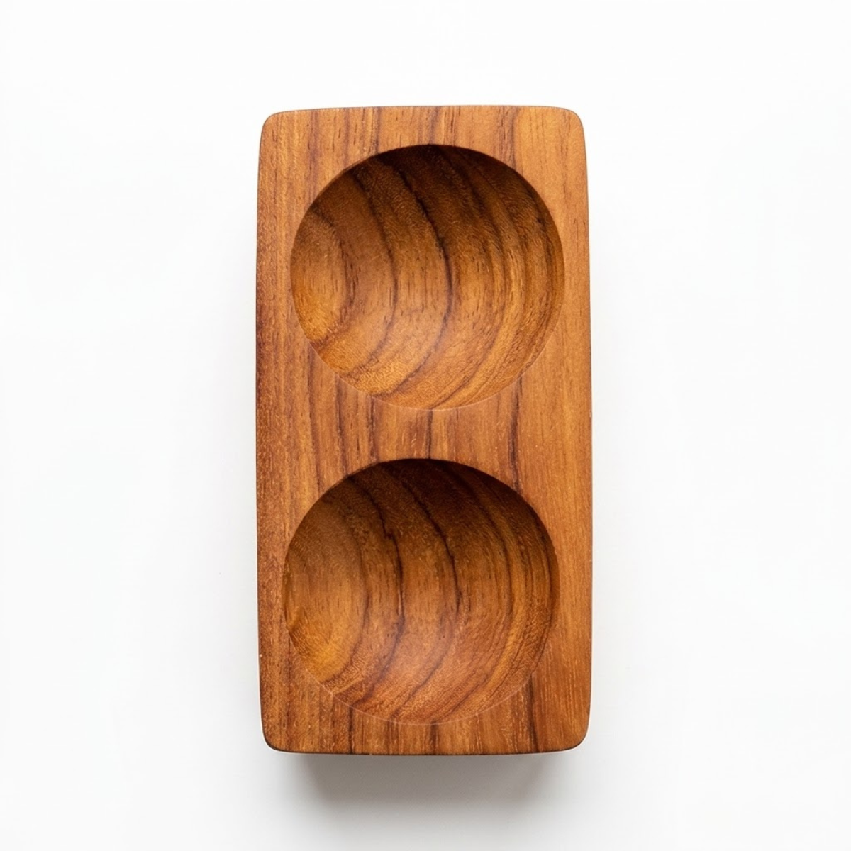 A Teak Wood bowl, with two indents, designed for condiments and spices on your table