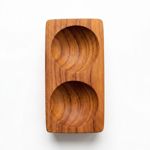 Handcrafted teak bowl, 12.5 cm's long with two indents for displaying condiments and spices on your table