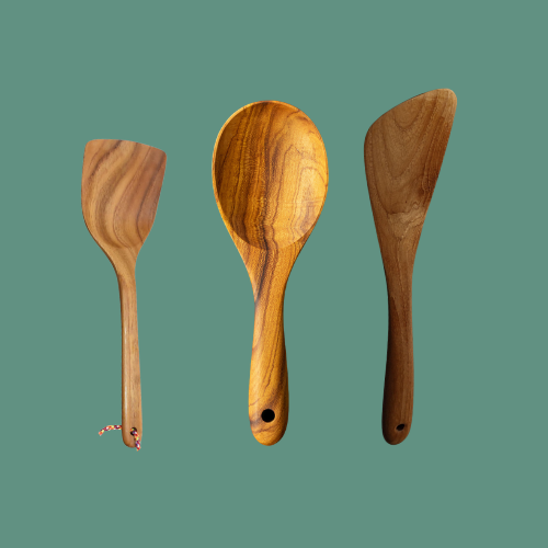 A set of two wooden spatulas and a wooden rice serving spoon