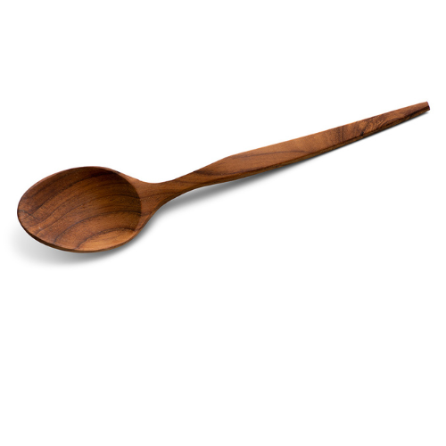 A high-angle product photograph of a handcrafted teak wood eating spoon, isolated on a crisp white background. The spoon features a wide, deep head and a tapered, ergonomically shaped handle, expertly carved from a single piece of sustainable teak. The image highlights the rich, swirling natural grain and smooth, food-safe finish of the wood, emphasizing its durable, non-toxic, and plastic-free design for daily dining.