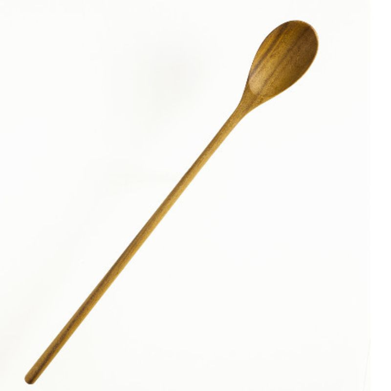A professional product photograph of a handcrafted teak wood parfait spoon displayed diagonally against a crisp white background. The spoon features an extra-long, slender handle and a smooth, oval-shaped head, expertly carved from a single piece of sustainable teak. The image highlights the rich, warm natural grain and food-safe finish of the wood, emphasizing its durable and non-toxic design for reaching into tall jars, stirring lattes, or serving desserts.