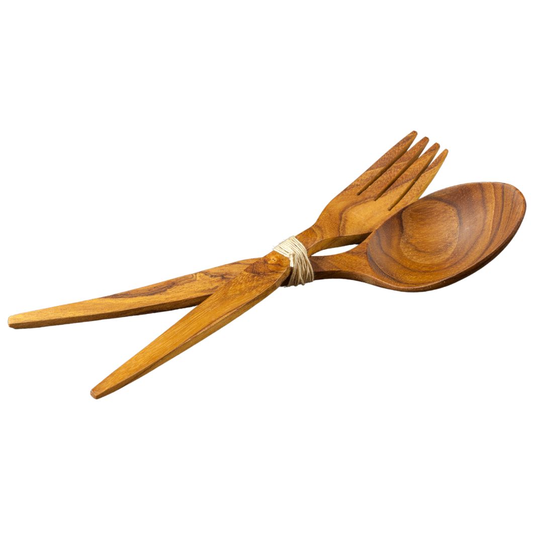 Handcrafted teak wood salad server set featuring a serving fork and spoon tied together with natural twine, isolated on a white background.
