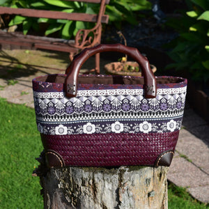 Vibrant handwoven bag with wooden handles