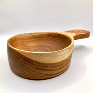 large handcrafted wooden bowl with handle