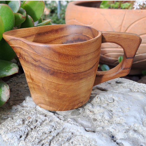 handcrafted wooden milk jug