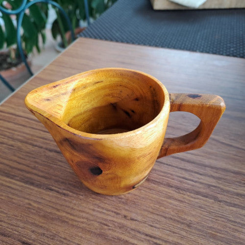 handcrafted wooden jug