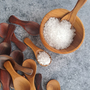 wooden spoon and salt bowl