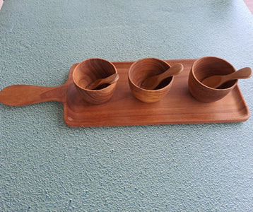 wooden tray with bowls and spoons