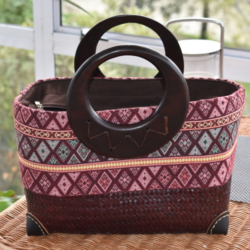 handwoven bag with wooden handle