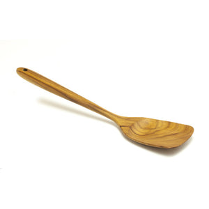 A premium, heavy-duty teak wood spatula with a wide, flat turner head and a long ergonomic handle, isolated against a clean white background. The image clearly shows the rich, natural wood grain and smooth, durable finish. This handcrafted kitchen tool is designed for flipping, stirring, and serving, making it an ideal addition to a professional-grade wooden utensil collection.
