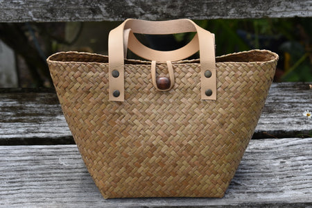 handwoven bag  with leather fastener
