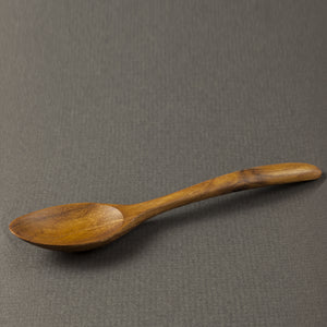 handmade wooden teaspoon for stirring coffee
